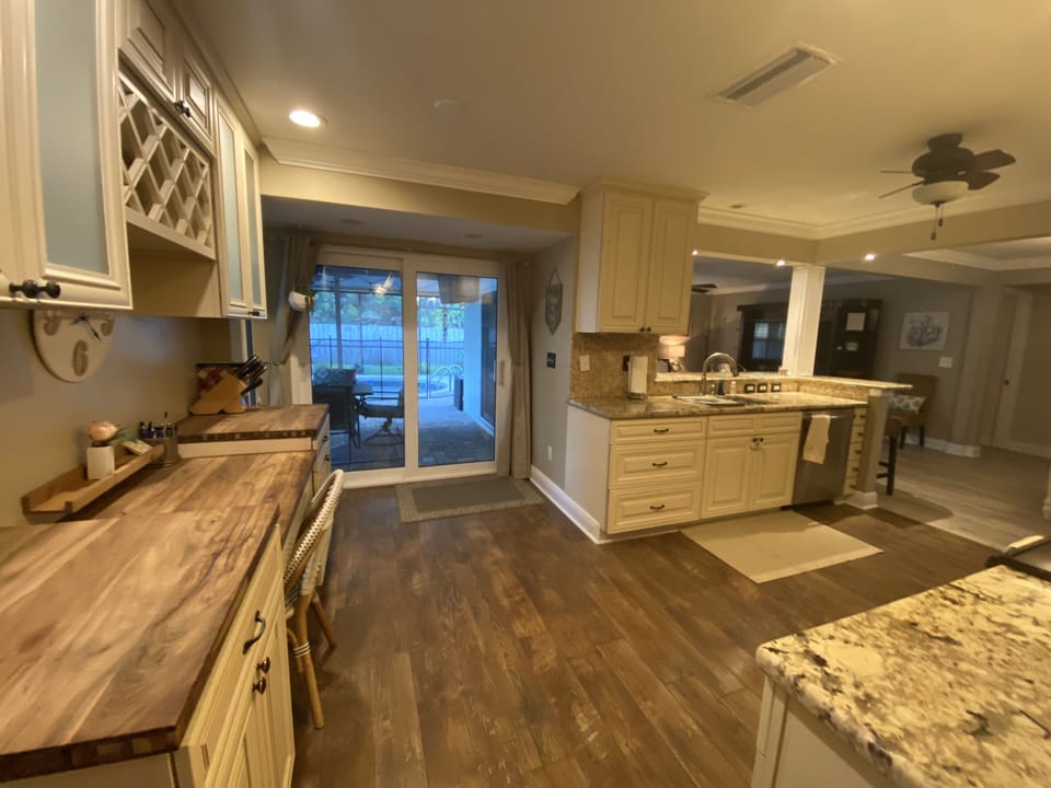 sliding door in kitchen leads to patio area 