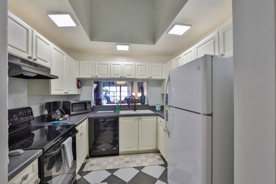 This kitchen has everything you need to make meals at home.