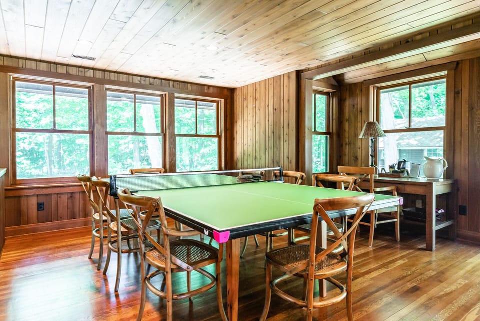 Dining table doubles as a ping pong table if you choose to put it on 
