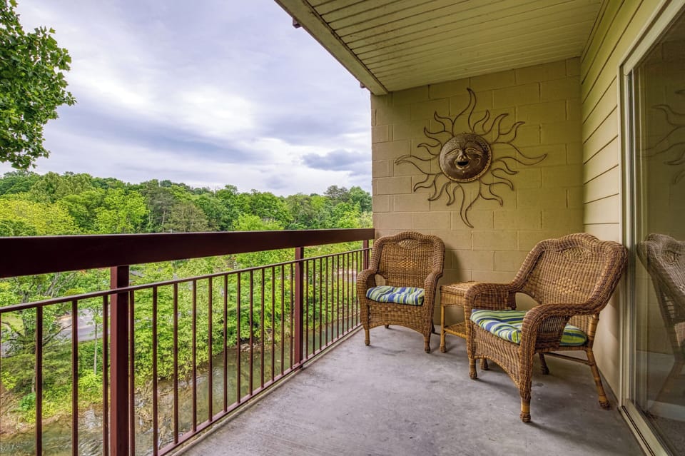 Enjoy the sights and sounds of the river from the private balcony