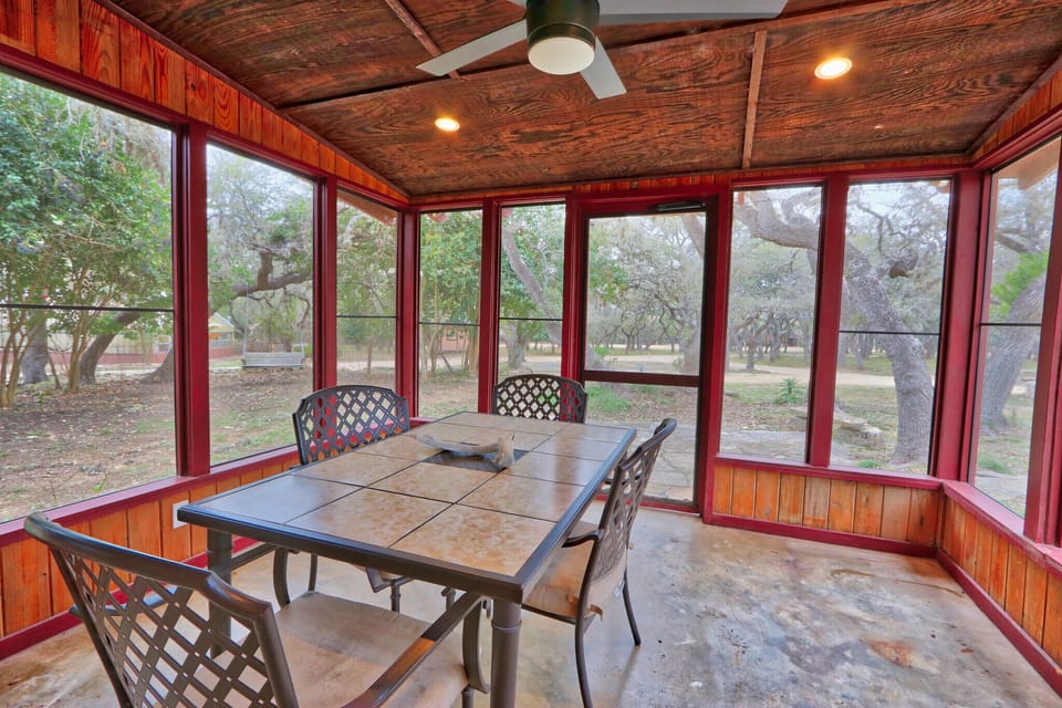 Screen patio with a dining table