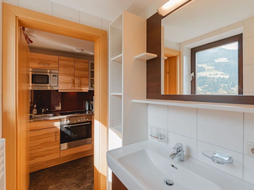 Mirror, Sink, Cabinetry, Tap, Property, Bathroom Sink, Furniture, Countertop, Plumbing Fixture, Bathroom Cabinet