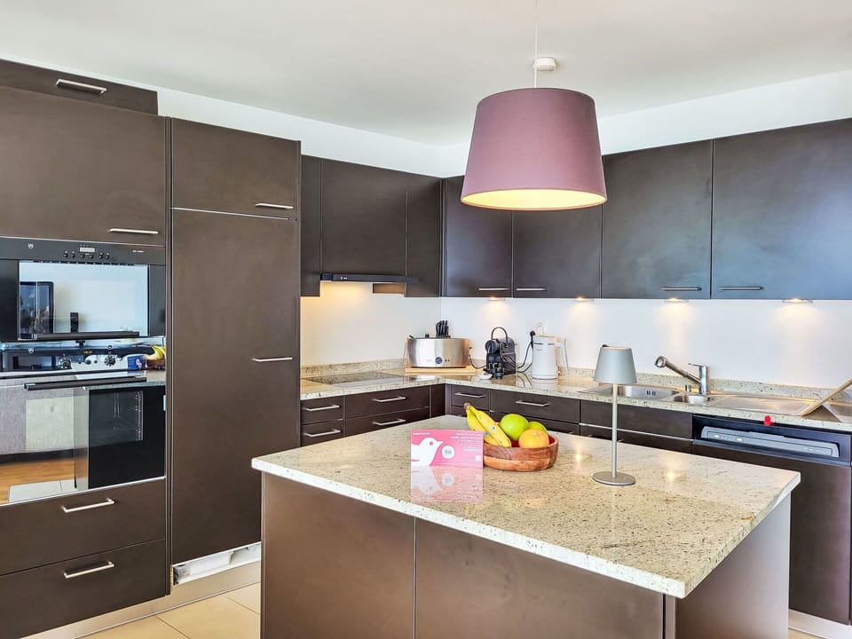 Kitchen, Furniture, Countertop, Kitchen Appliance, Interior Design, Cabinetry, Flooring, Major Appliance, Floor, Wood