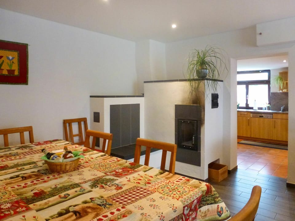 Furniture, Property, Table, Picture Frame, Cabinetry, Chair, Plant, Interior Design, Wood, Tablecloth