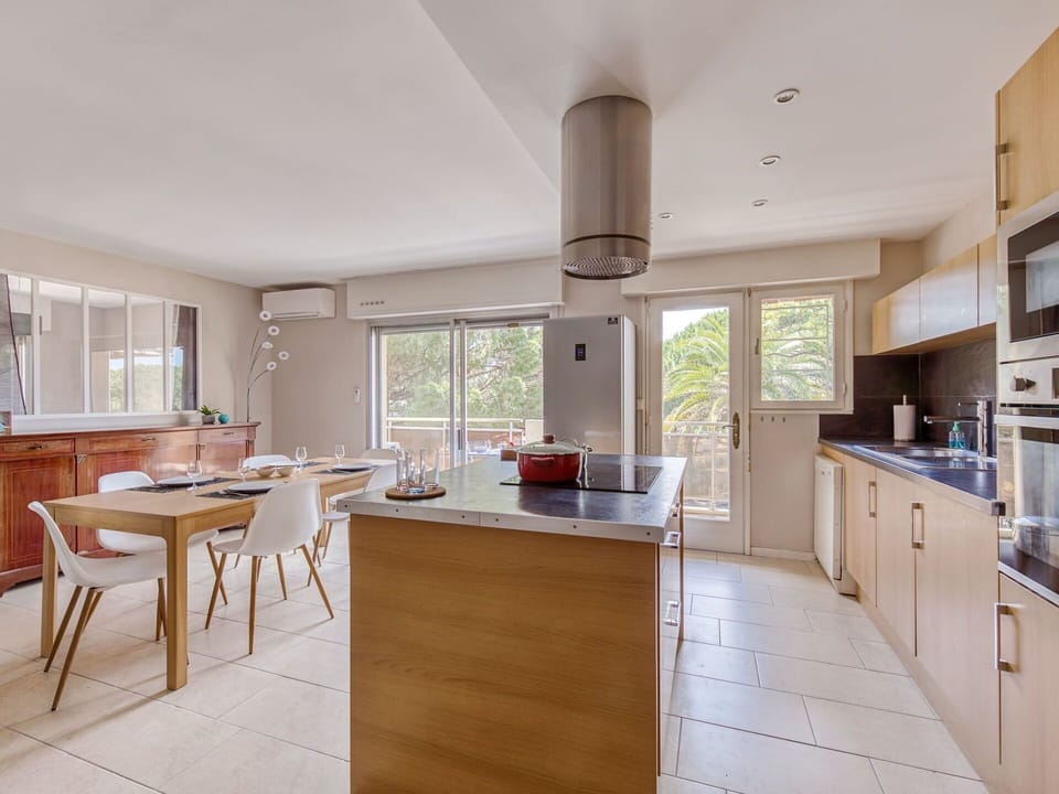 Furniture, Cabinetry, Countertop, Table, Kitchen, Wood, Interior Design, Window, Building, Chair
