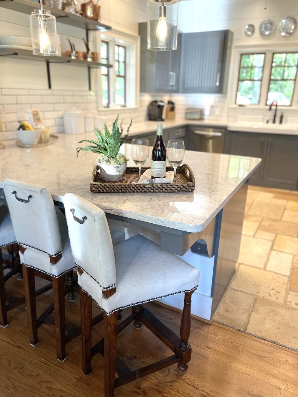 Wonderful bartop for entertaining & Holland & McRea hide on hair stools