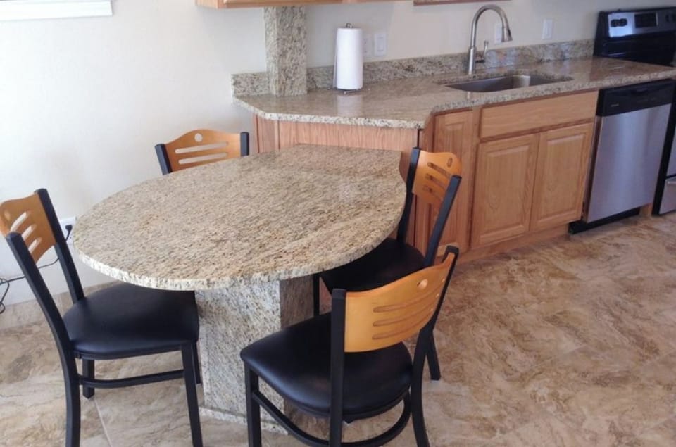 TWO LEVEL GRANITE SEATING FOR four 
Bring food