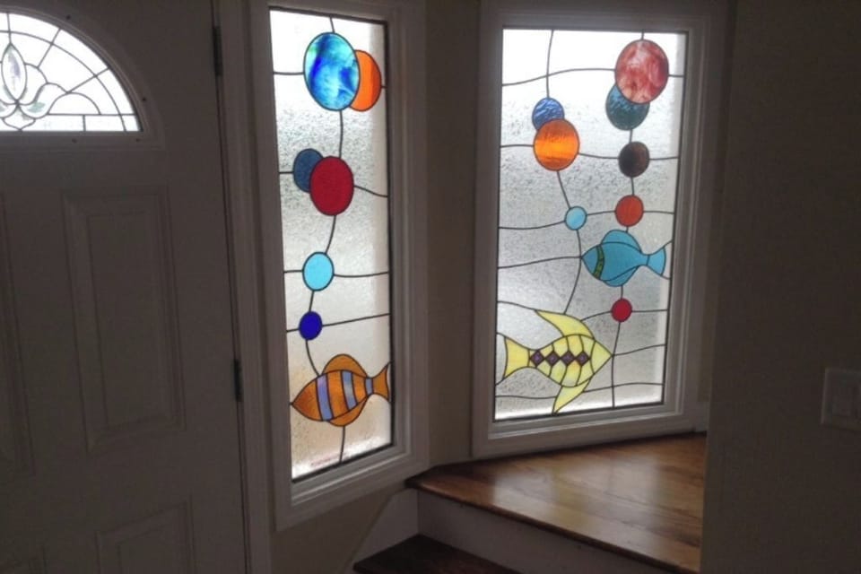 Stain glass steps lead up to Upper Floor