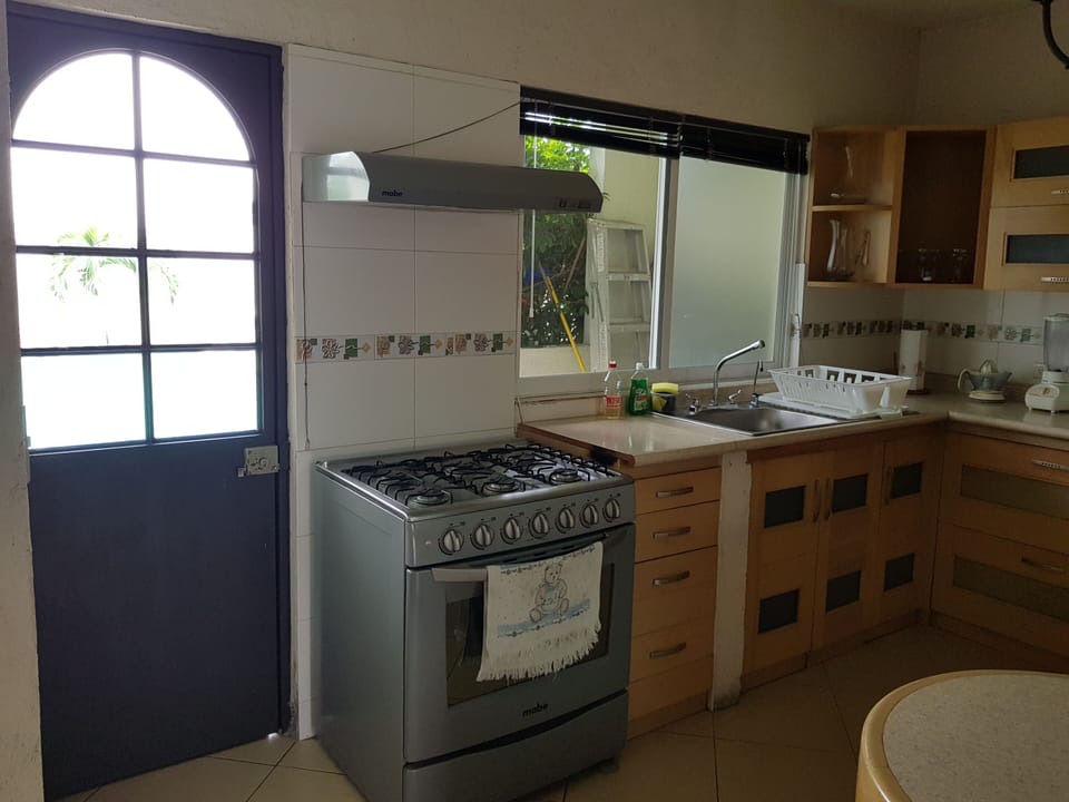 Exit to garden next to kitchen