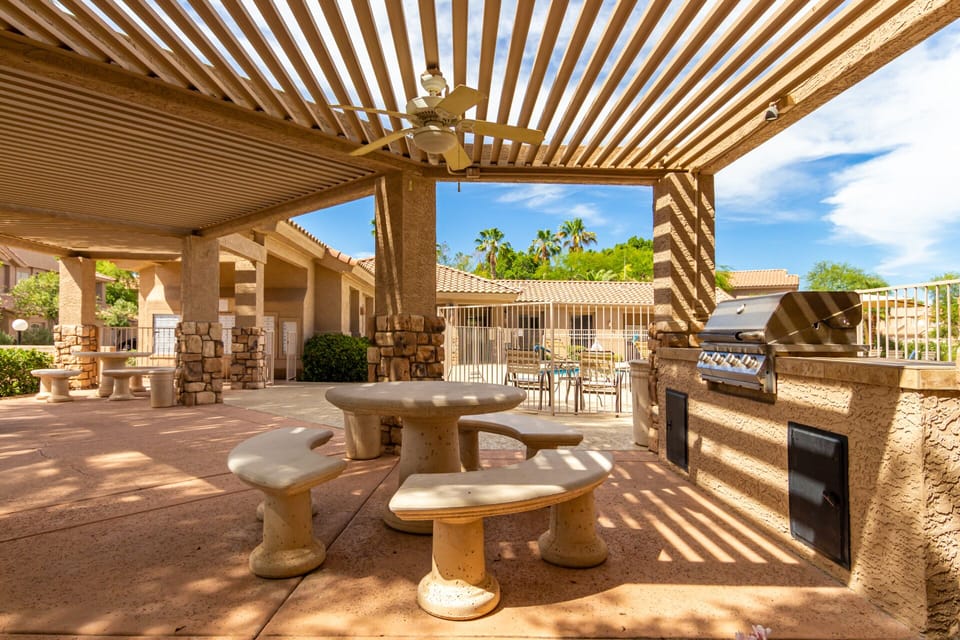 Community Gas Grill with seating and pergola shade!