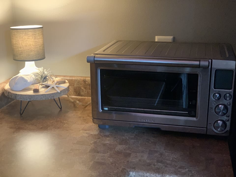Fully stocked kitchen w/ coffee pot, toaster, convection oven, and much more!