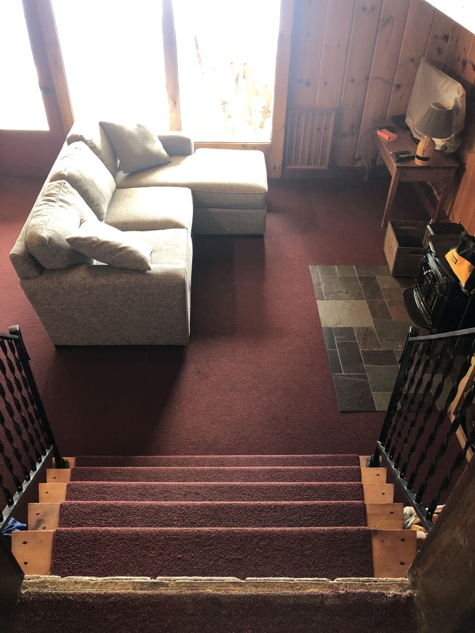 stairs down to den couch/tv
