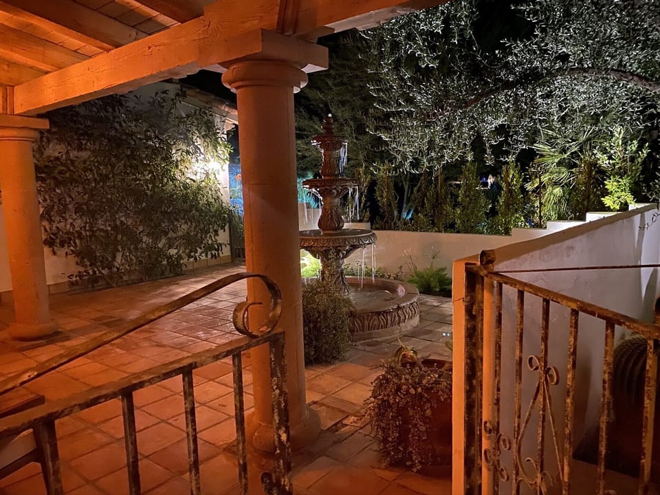 Enjoy the front patios soothing sounds from the fountain. 