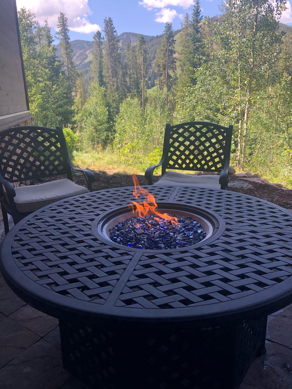 Lower patio area with gas fire pit. 