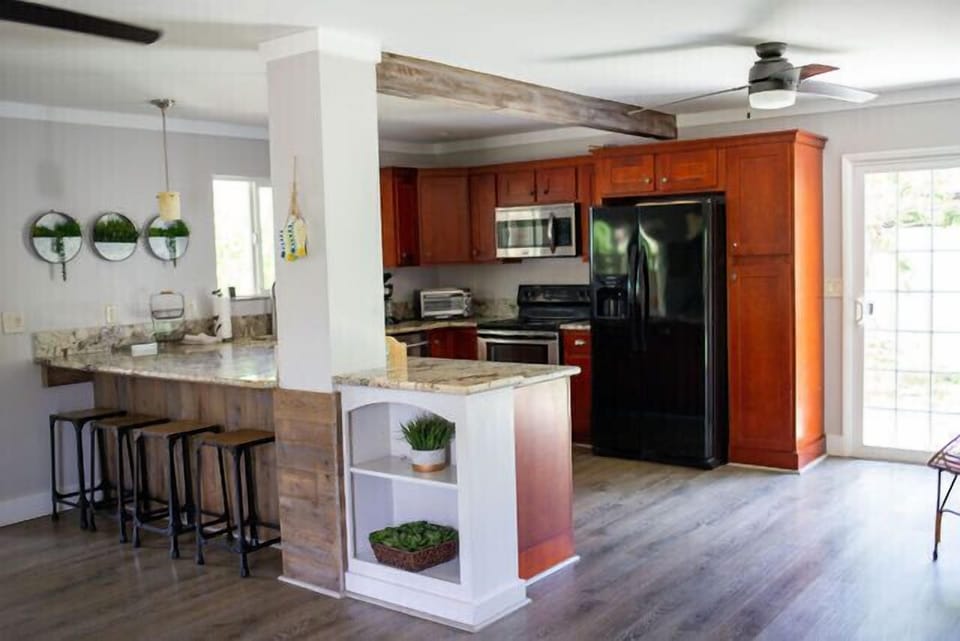 spacious, stocked kitchen