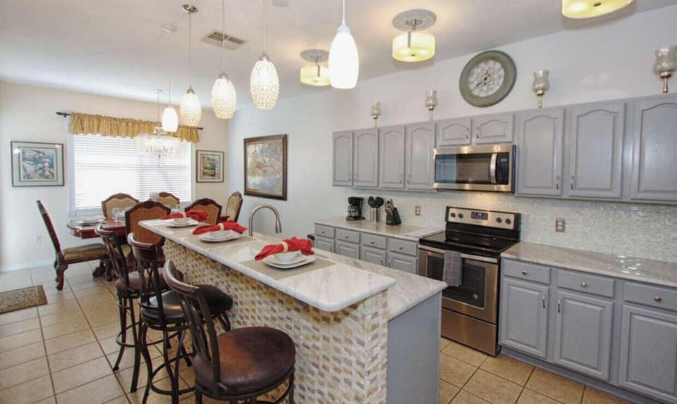 Beautiful  kitchen with stainless steel appliances 