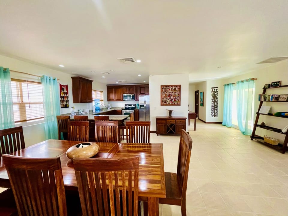 Kitchen & dining area with view to hall to bedrooms