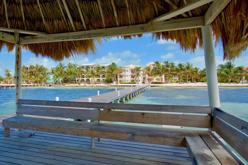 Rest in the shade under the palapa on the pier