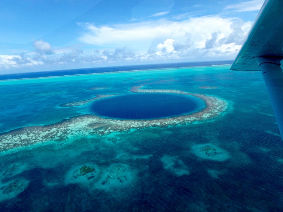 Dive or fly over Belize's Great Blue Hole!