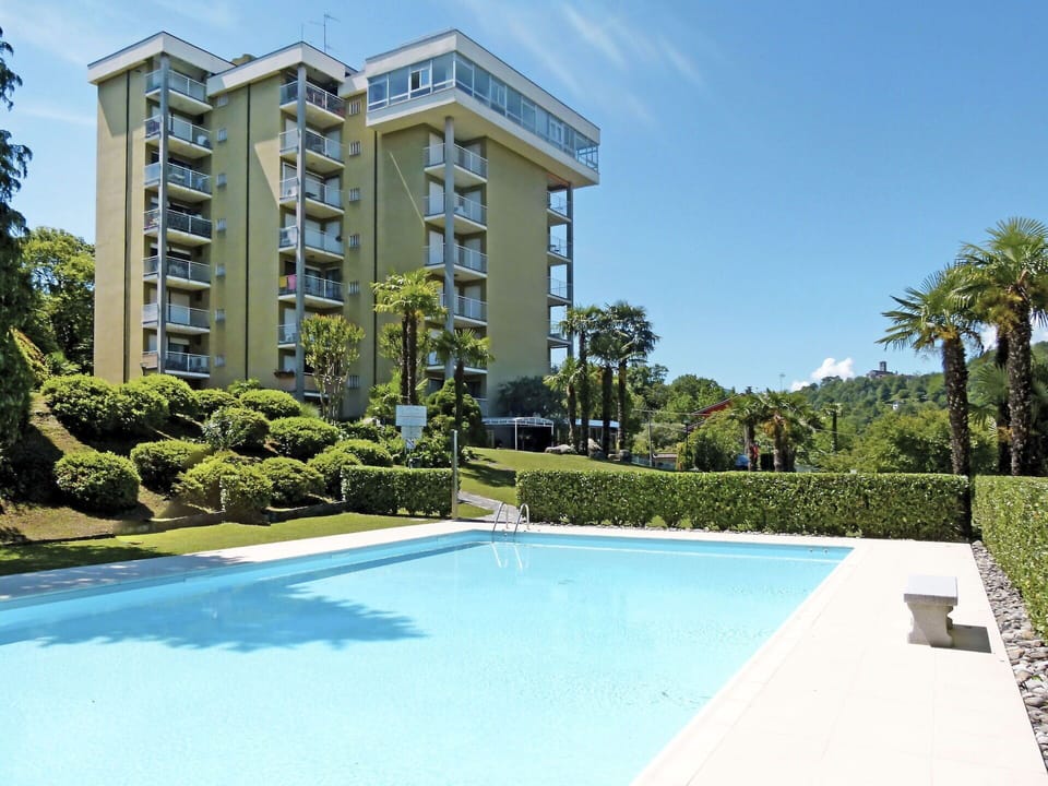Water, Sky, Plant, Daytime, Property, Building, Azure, Tree, Swimming Pool, Grass