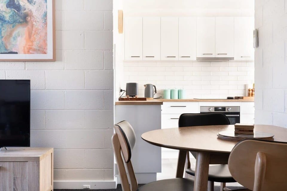 Seamless flow from the living-dining into the renovated kitchen