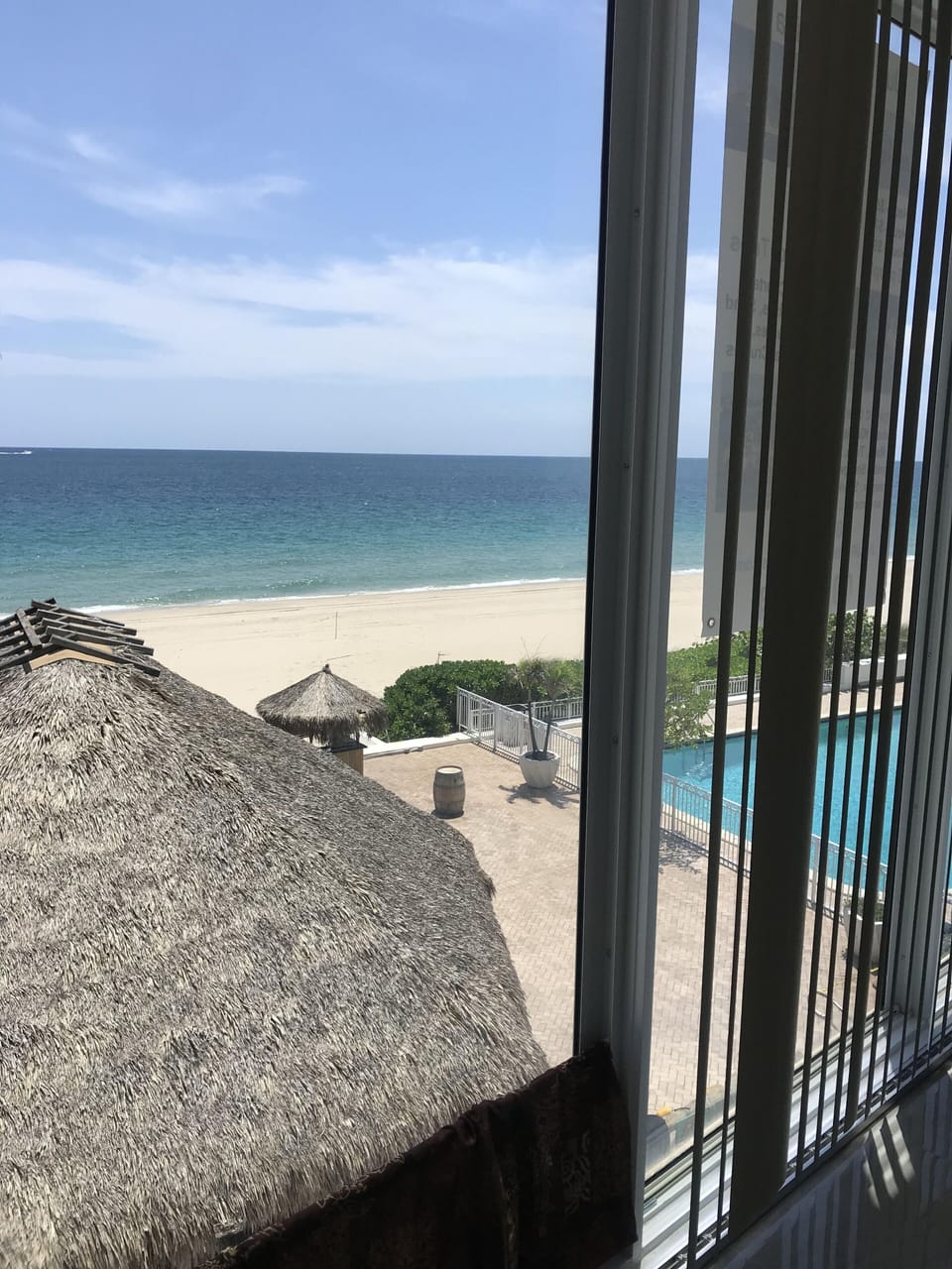 View from couch in condo during Corona.  Beach closed but owner's area open.  