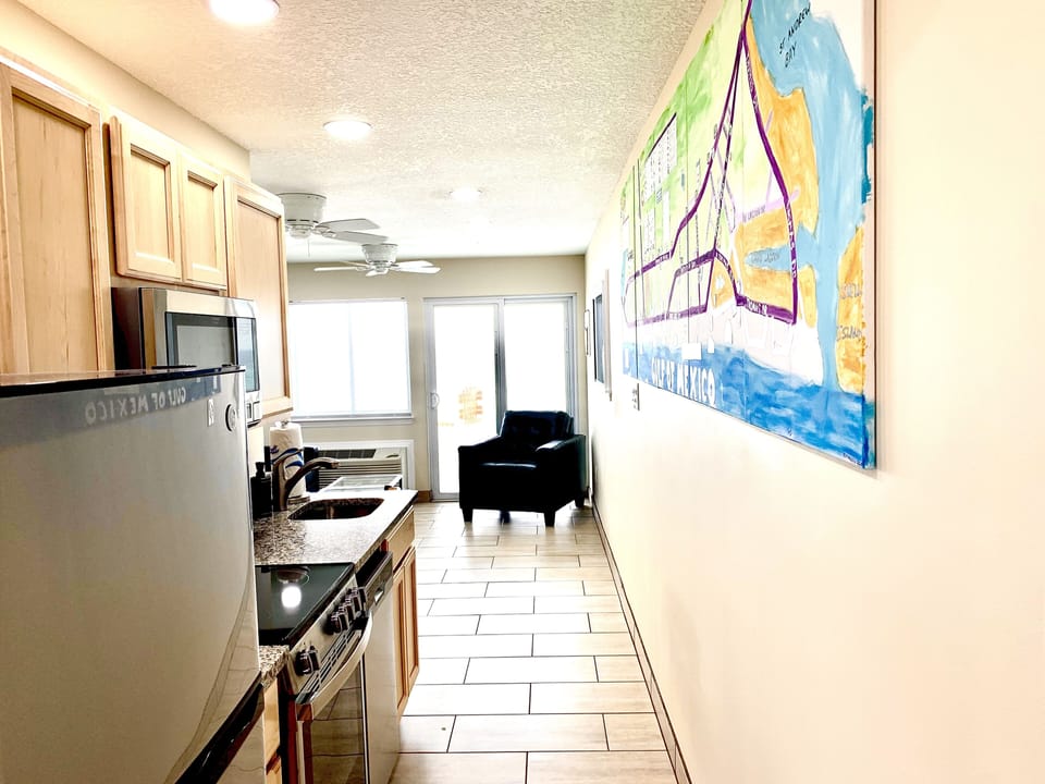 From Bedroom walking thru Kitchen To Living Space