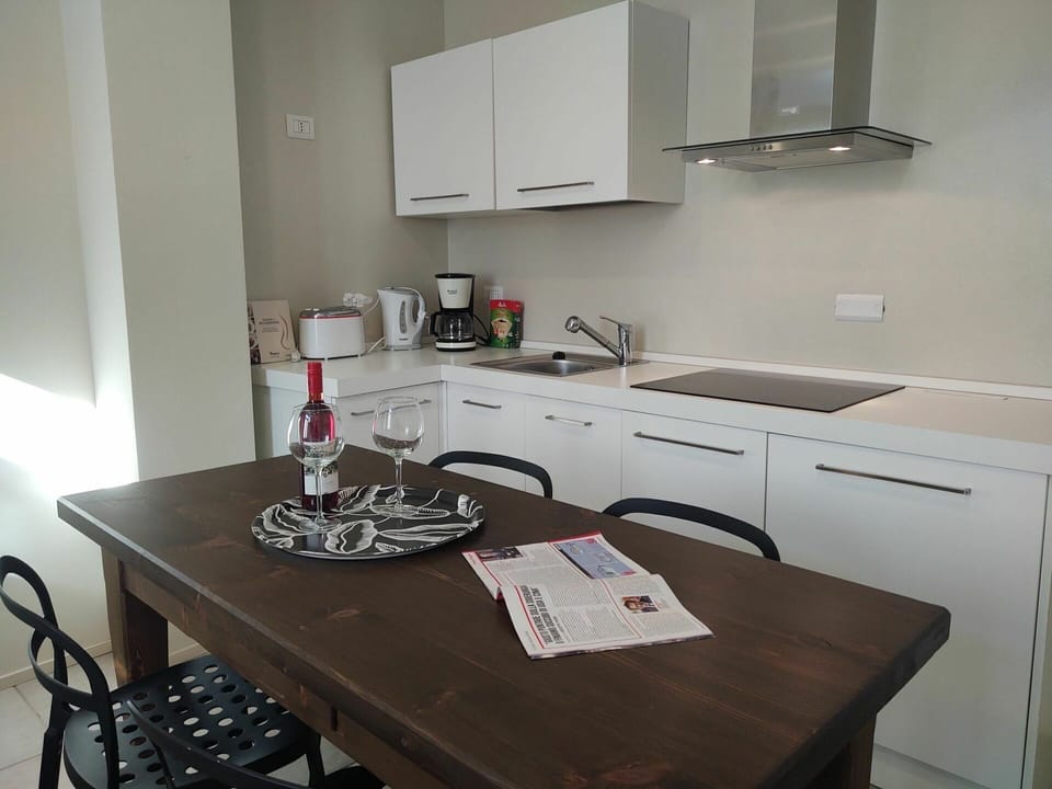 Table, Furniture, Property, Cabinetry, Building, Tableware, White, Chair, Kitchen, Wood