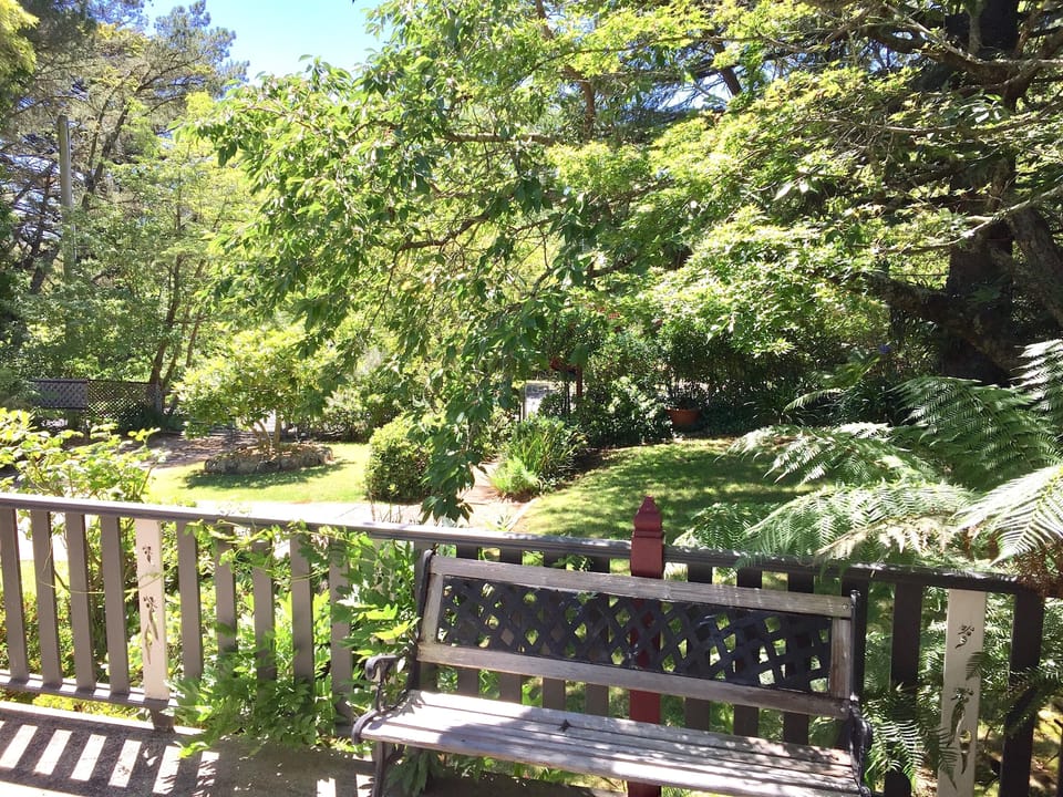 Overlooking the private front garden from the outdoor patio. Peaceful & tranquil