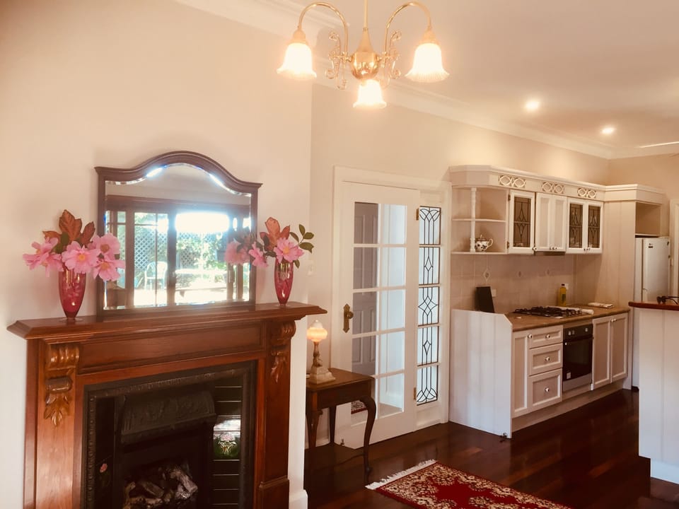 Kitchen/Family room with gas heating & French doors onto private garden with BBQ
