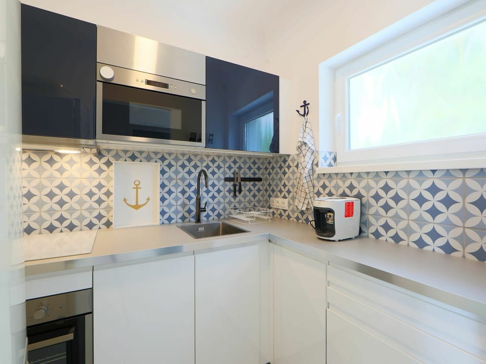 Property, Room, Interior Design, Tile, Cabinetry, Countertop, Furniture, Real Estate, Building, Bathroom