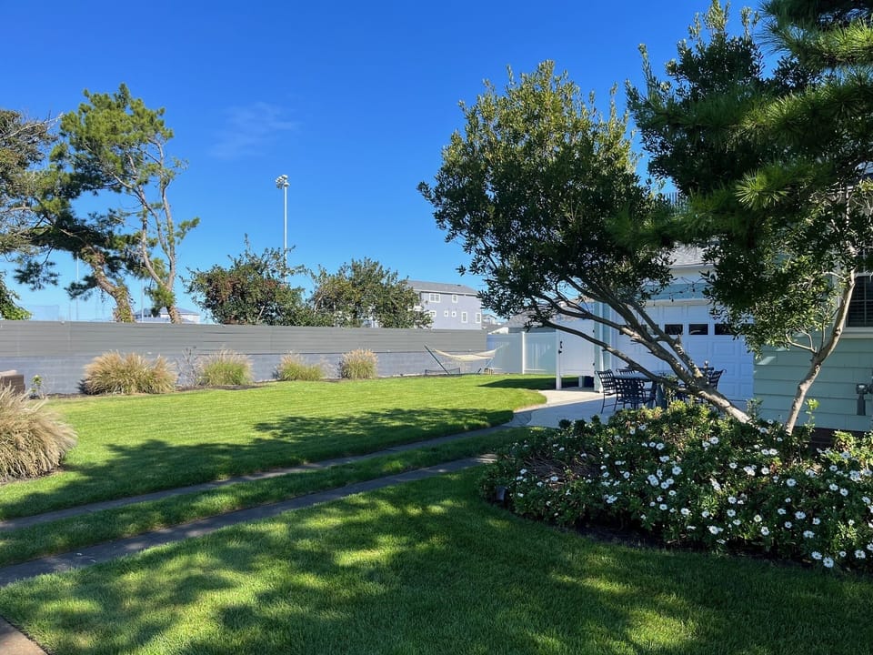 huge, private fenced back yard