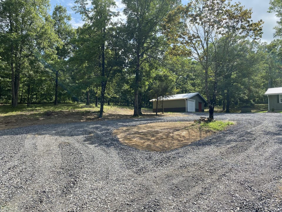 Circle driveway for trailer parking and easy turn around.