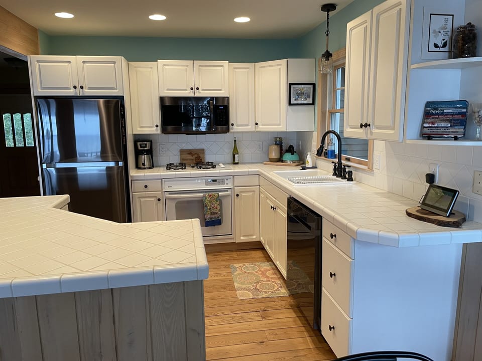 Kitchen with new black stainless appliances 
