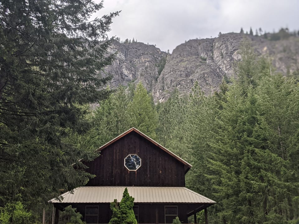 Goat Wall towers over and shelters Mazama Retreat. 