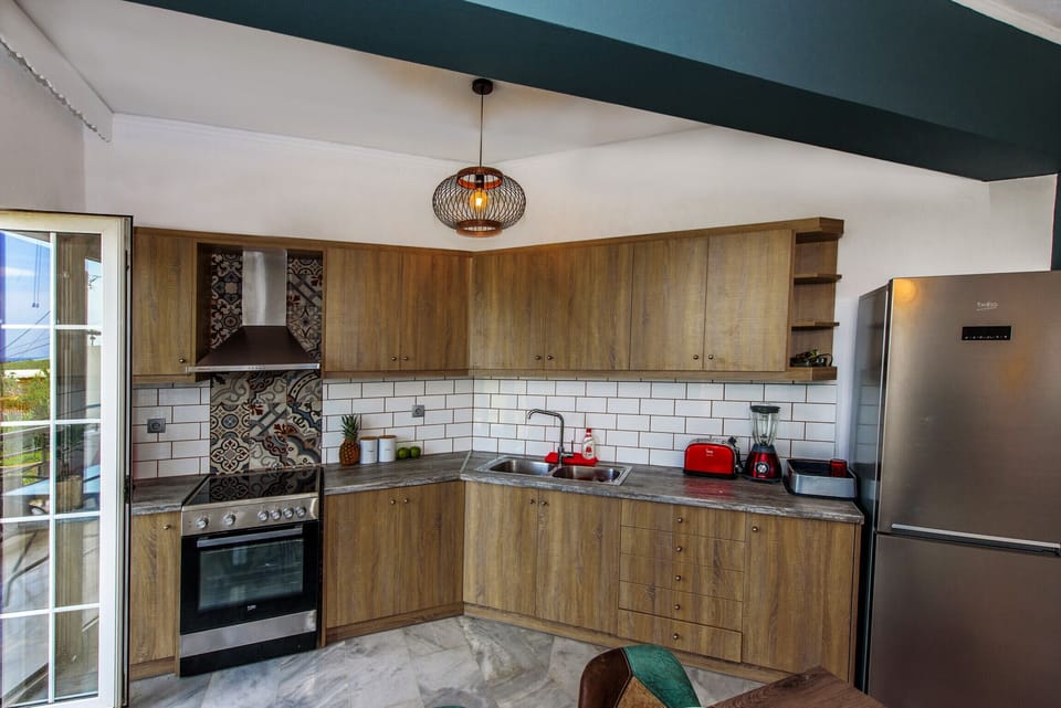 Open-plan fully equipped kitchen of Modern villa, Platanes, Rethymno, Crete