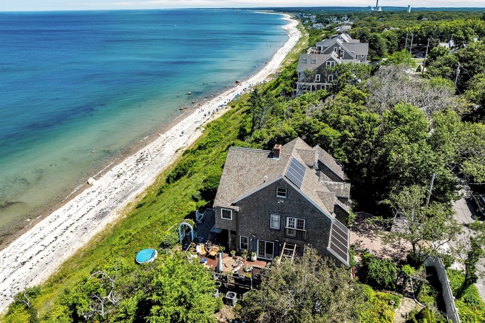 5 houses down from the Stairs to the Beach