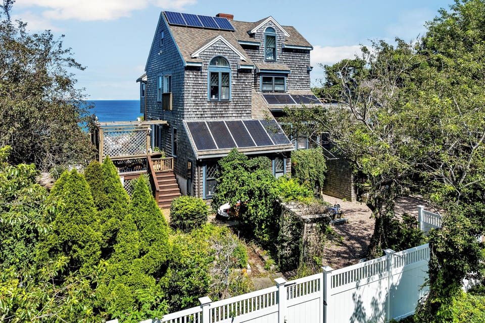 Dramatic Cliff House Perched on the Bay