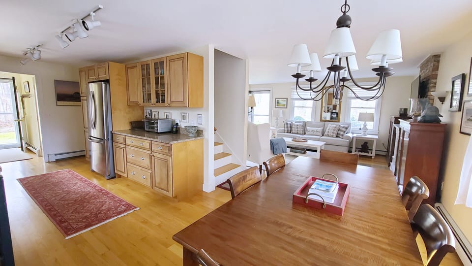 Dining area opens to kitchen and living room