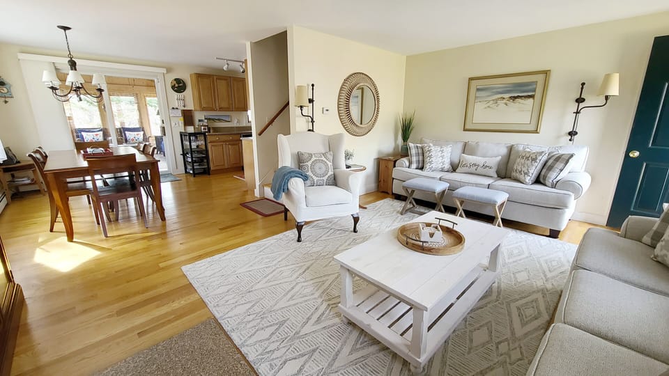 Living room opens to the dining area and kitchen