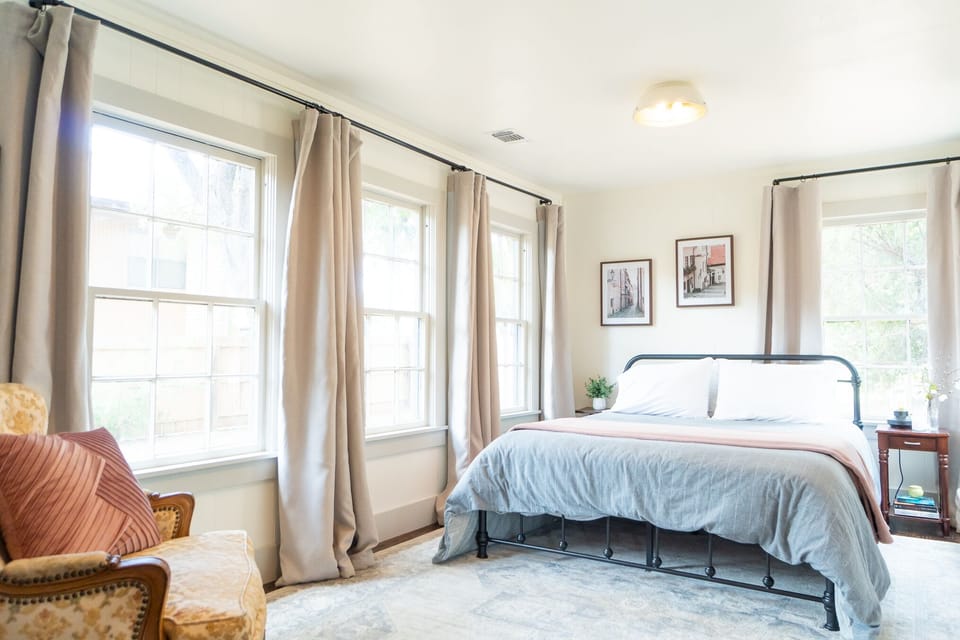 A beautiful & spacious master w/five windows for stunning natural light!