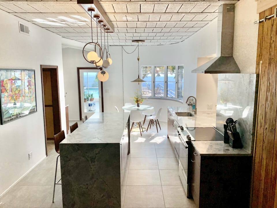 Kitchen: island seating, breakfast nook seating.  Not pictured: dining table 4 