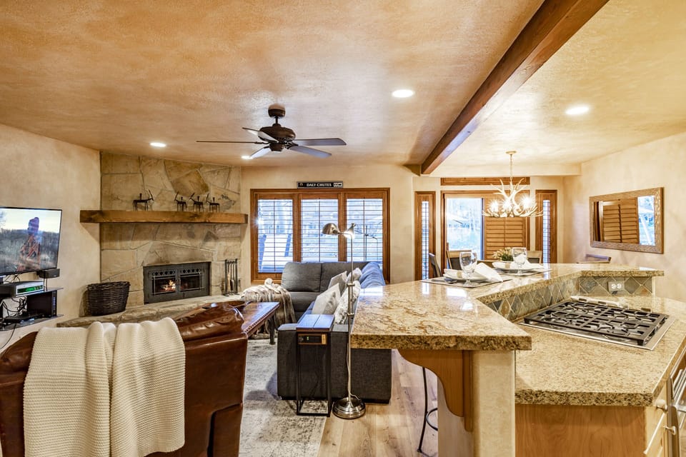 The downstairs is spacious and features the living room, dining room, and kitchen