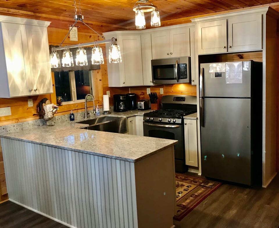 Brand new kitchen w everything needed to make a great meal. Ice maker in refrig.