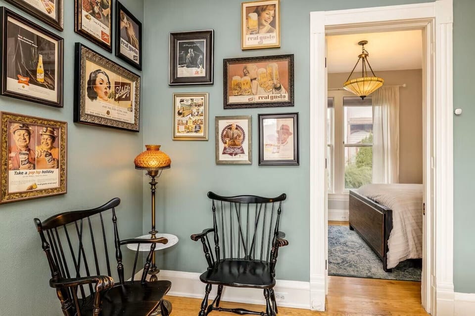 Cozy entertainment space with fireplace and games for group nights.