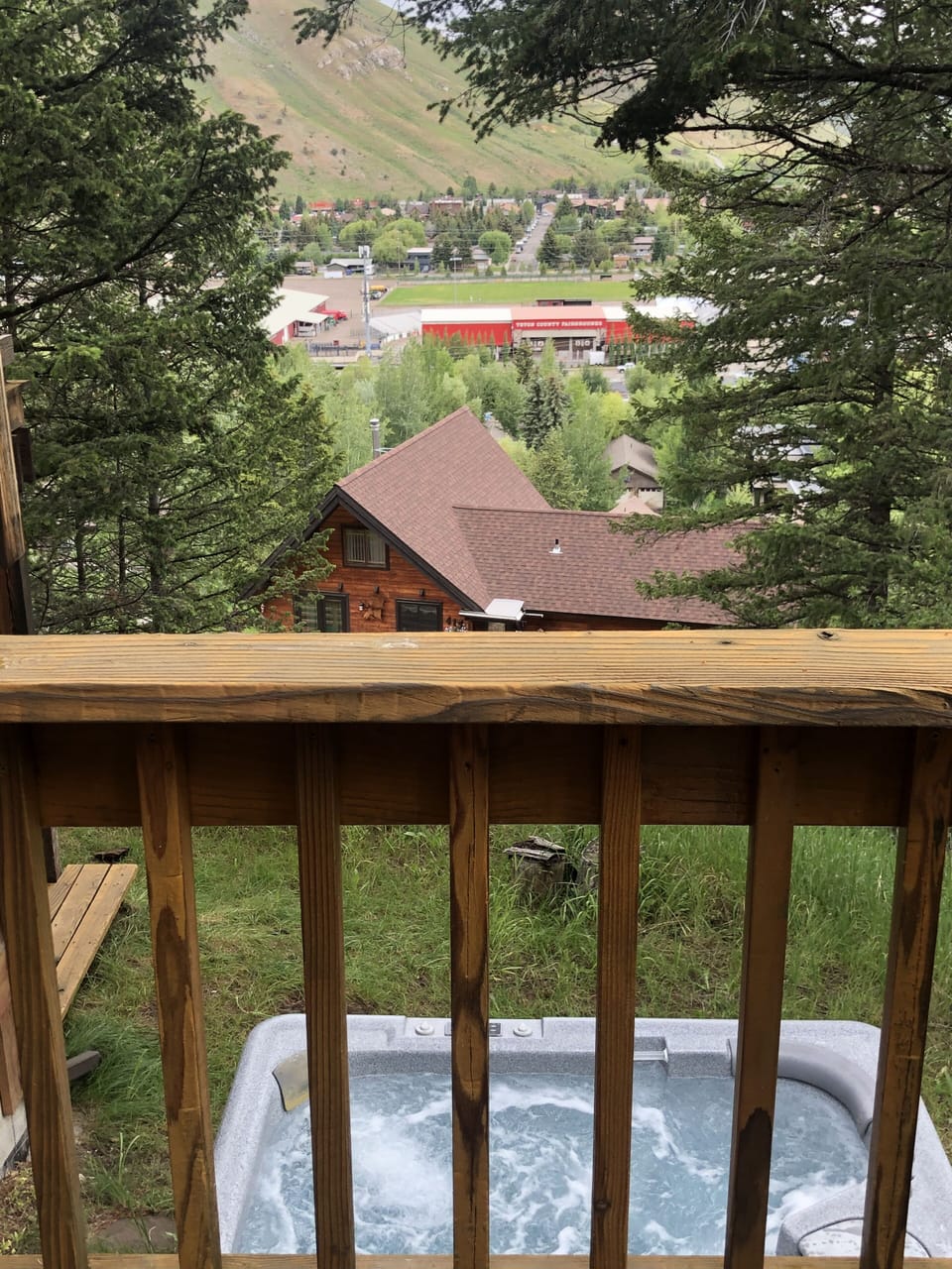 View from Dining Deck looking N over hot tub and into town