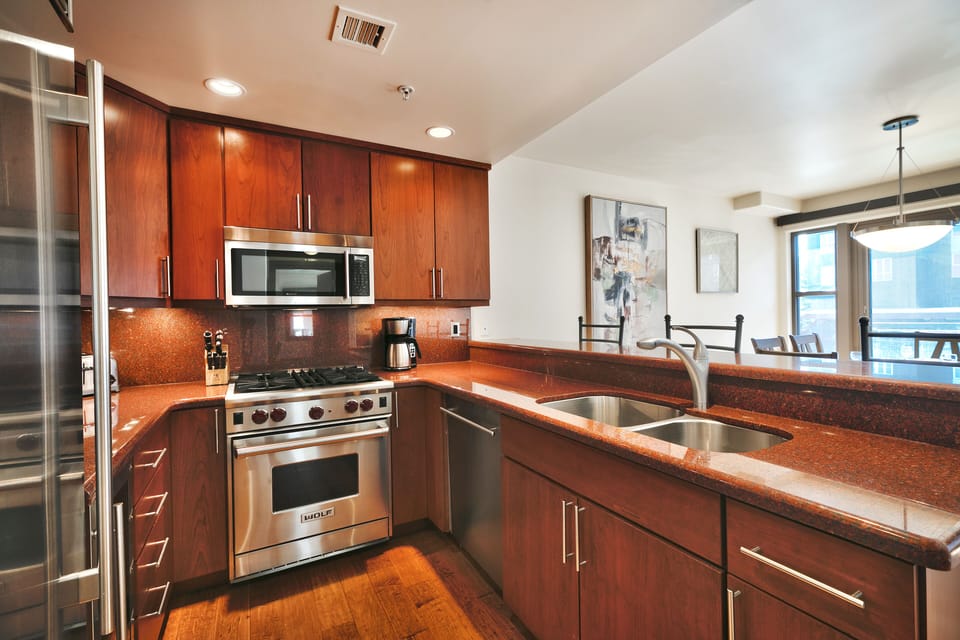 Fully equipped kitchen with stainless steel appliances