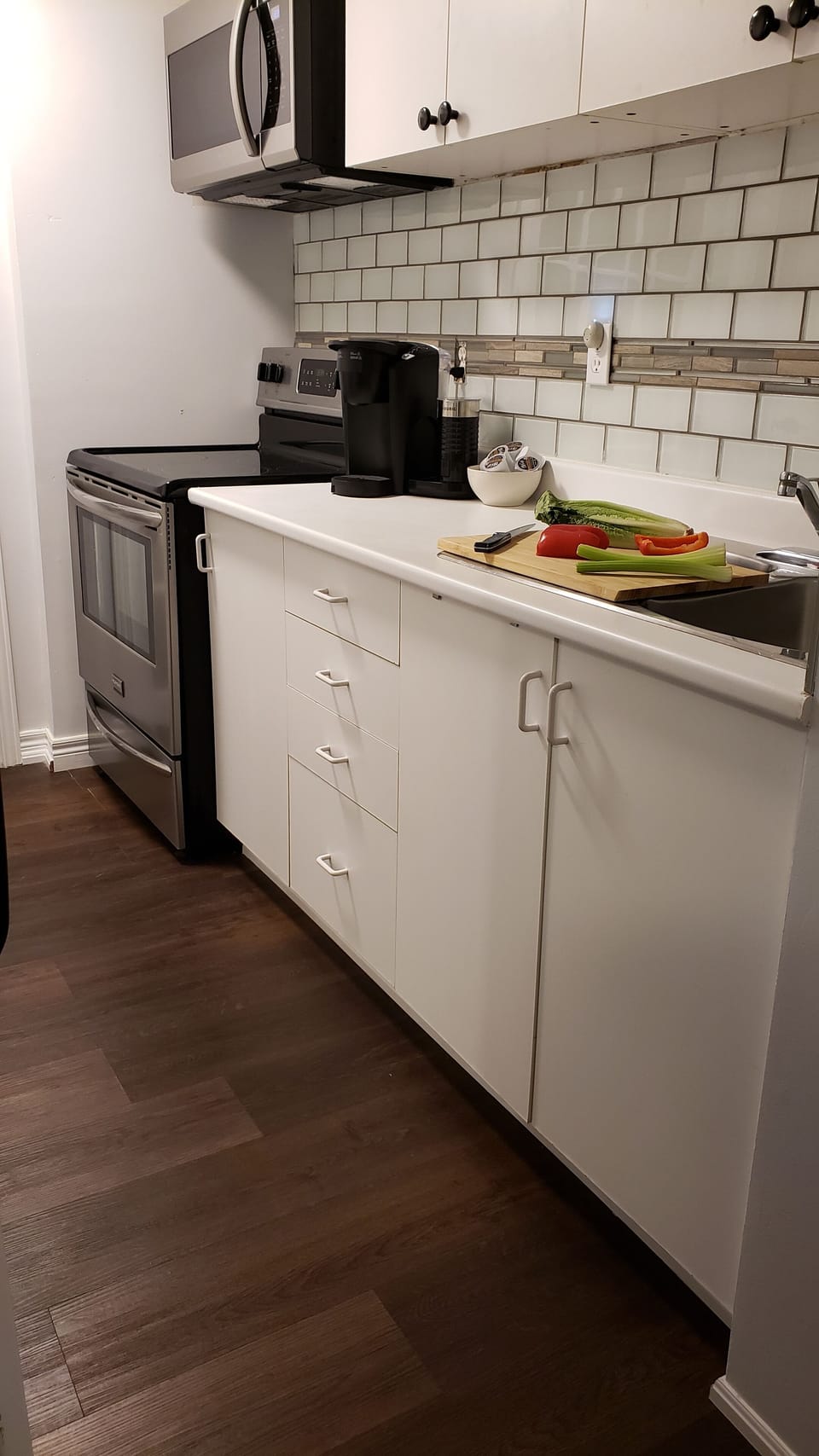 Full-size convection oven and stovetop, full-size fridge.
