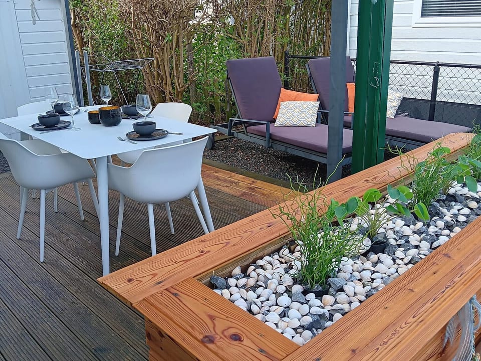The cozy garden with garden furniture of RBR 1714 - Beach Resort Kamperland