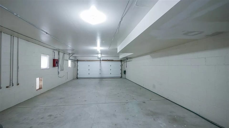 The garage is shared. You have 2 spots in there and 1 in driveway.